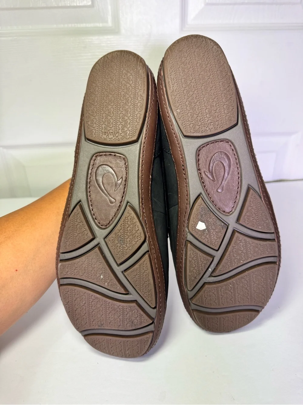 OluKai Black and Brown Leather Boat Moccasins with Tan Laces